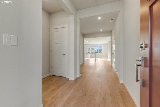 hallway featuring light hardwood / wood-style floors