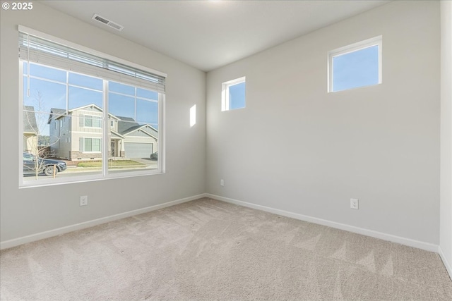 view of carpeted spare room