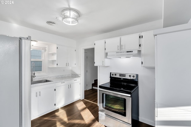 2746 Colorado St, Longview, WA 98632 - kitchen featuring stainless steel appliances, under cabinet range hood, open shelves, light countertops, and white cabinetry