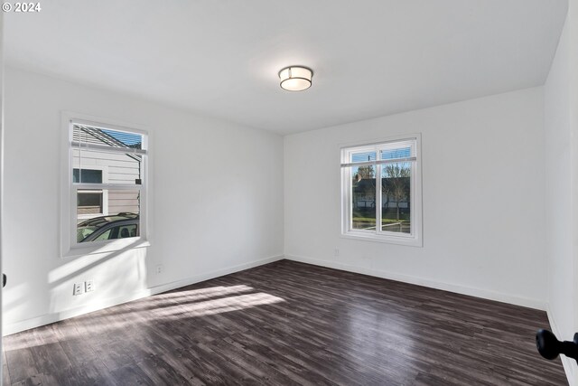 2746 Colorado St, Longview, WA 98632 - empty room featuring dark wood-style floors and baseboards