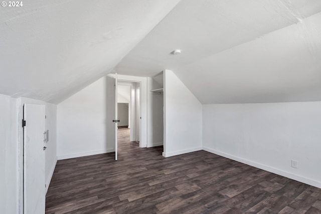 2746 Colorado St, Longview, WA 98632 - additional living space with dark wood-style flooring, lofted ceiling, and baseboards