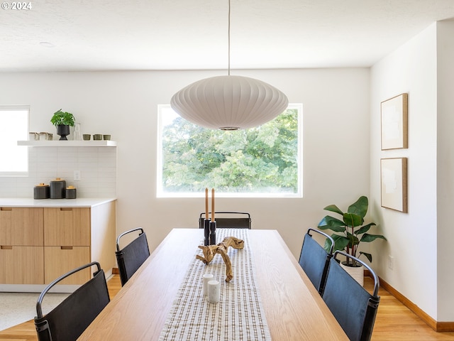 dining room with light hardwood / wood-style flooring