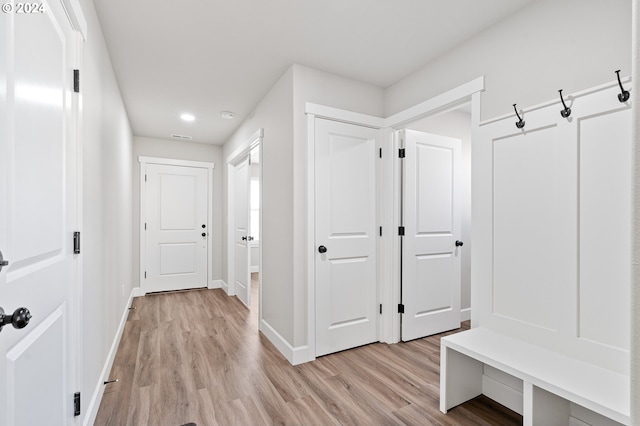 mudroom featuring light wood-type flooring