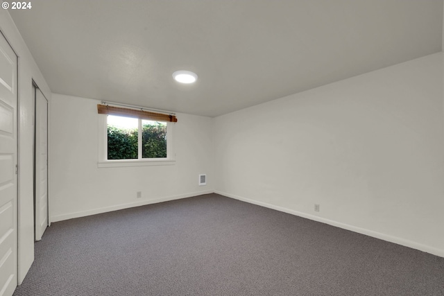 interior space with dark carpet