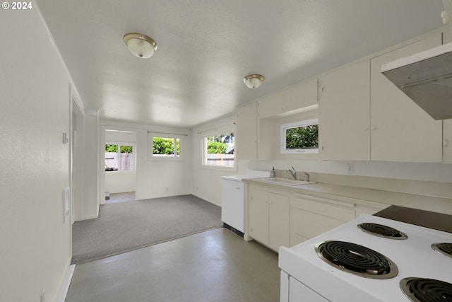 kitchen featuring ventilation hood, white range with electric cooktop, white cabinetry, sink, and a textured ceiling