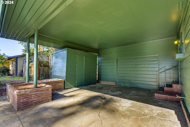 view of terrace featuring a shed