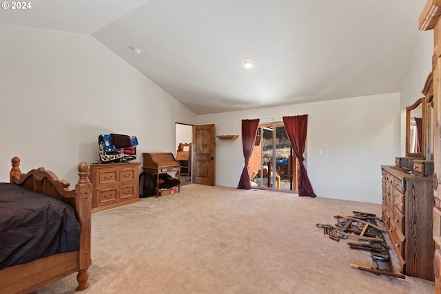 bedroom featuring light carpet and lofted ceiling