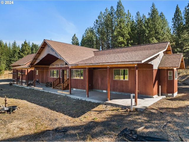 view of front of house with a patio area