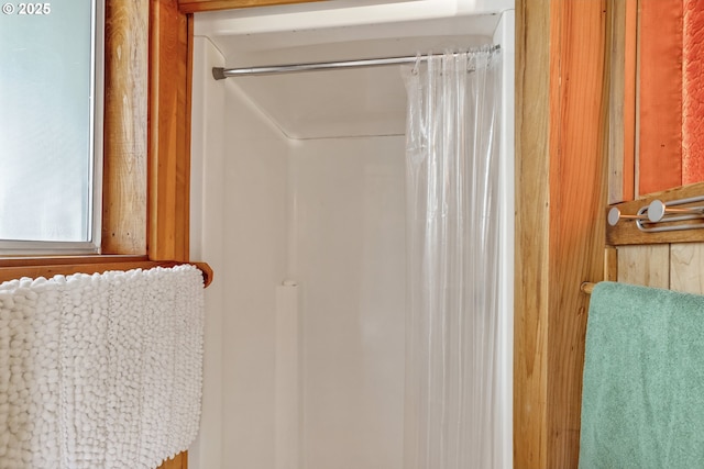 bathroom with a shower with shower curtain