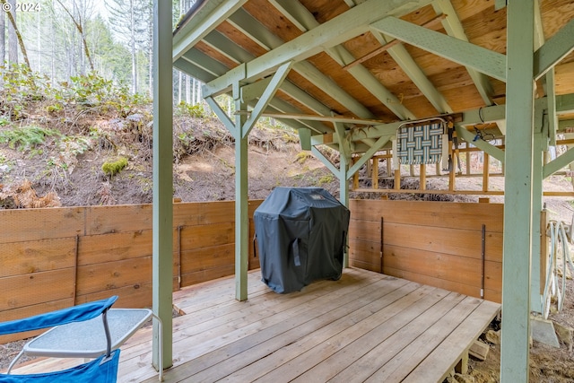 wooden deck with area for grilling