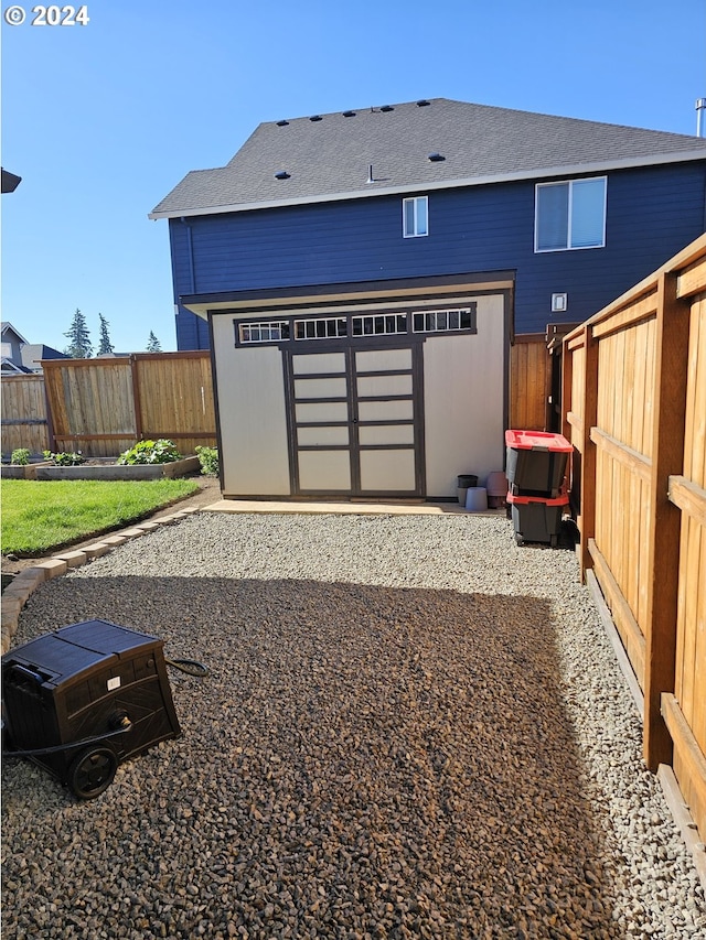 exterior space with a shed