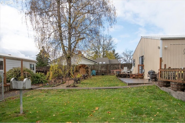 view of yard with a deck