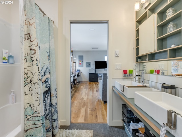 kitchen featuring dark hardwood / wood-style floors and sink