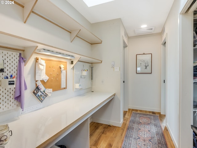 interior space featuring hardwood / wood-style floors and tasteful backsplash