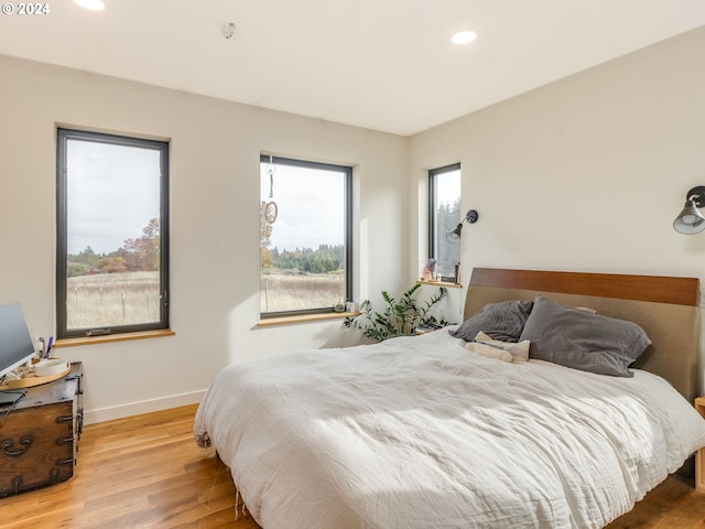 bedroom featuring light wood-type flooring