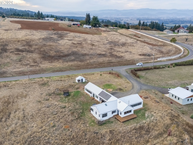 aerial view featuring a mountain view and a rural view