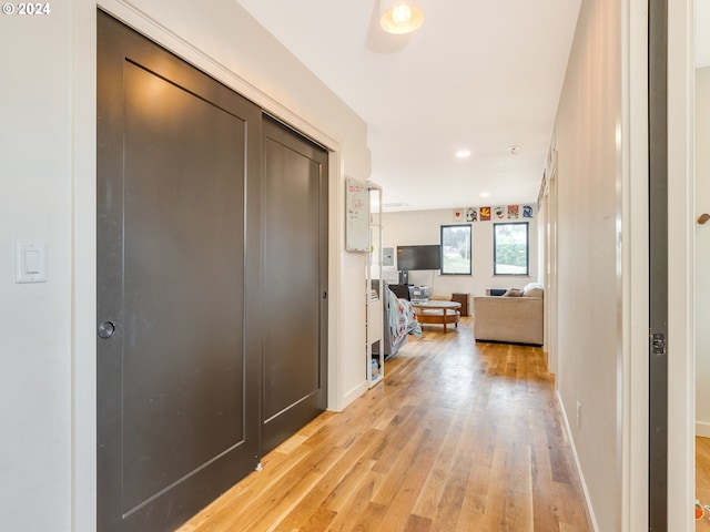 hallway featuring light hardwood / wood-style flooring