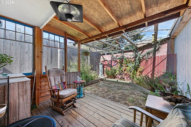 sunroom with vaulted ceiling