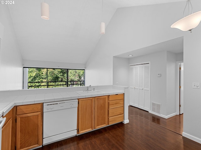 kitchen featuring sink, high vaulted ceiling, white dishwasher, dark hardwood / wood-style floors, and tile countertops