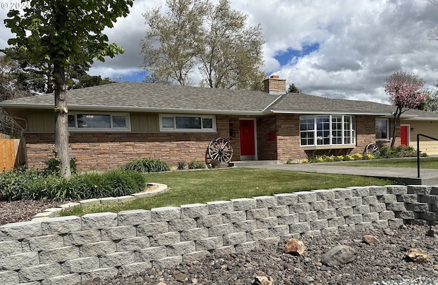 ranch-style home featuring a front yard