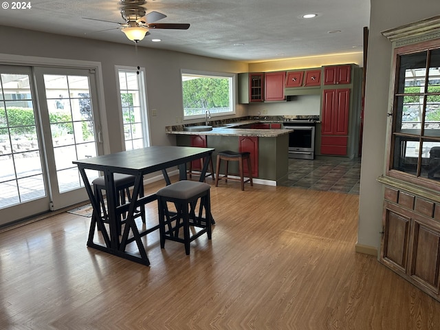 dining area featuring a textured ceiling and ceiling fan