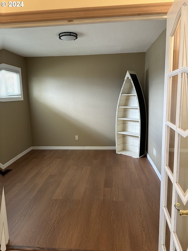 spare room featuring hardwood / wood-style floors