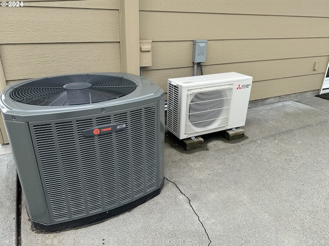 details featuring ac unit and cooling unit