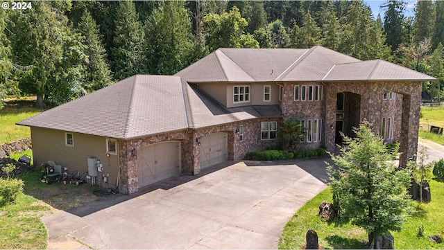 view of front of property with a garage