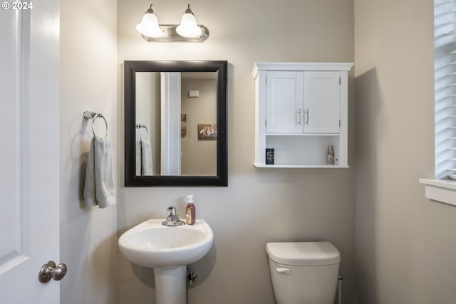 bathroom featuring toilet