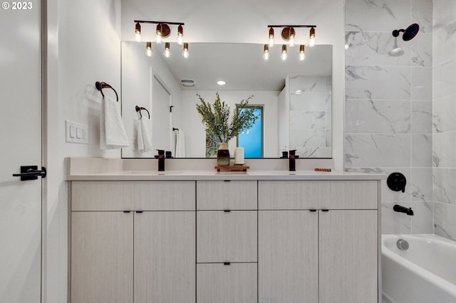 full bathroom with shower / bathtub combination, a sink, and double vanity