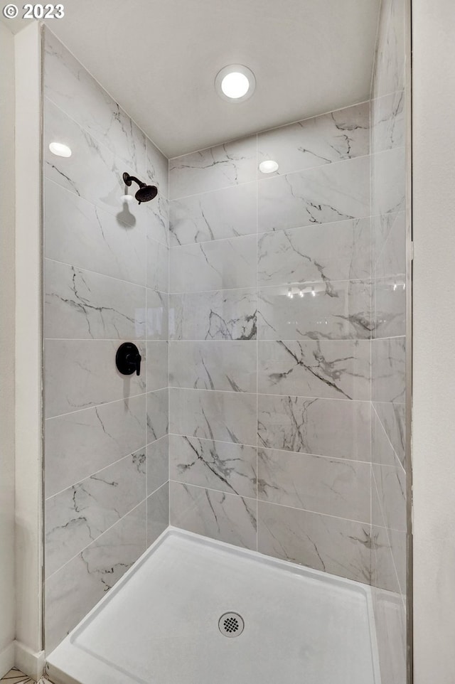 bathroom featuring a stall shower