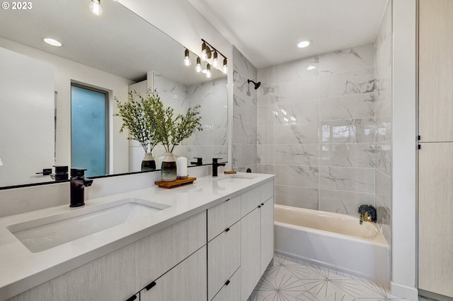 full bath with tile patterned flooring, bathing tub / shower combination, a sink, and recessed lighting