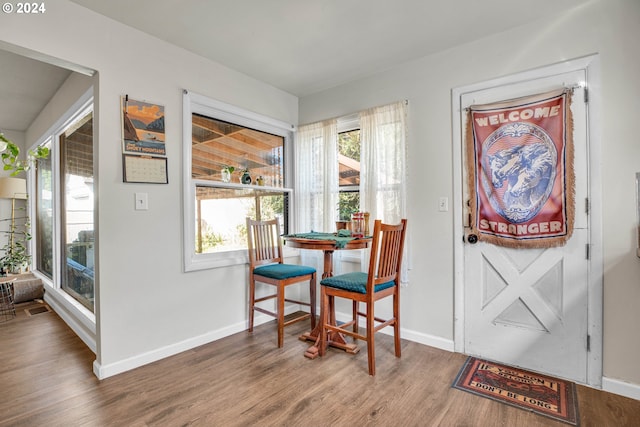 dining room featuring wood-type flooring