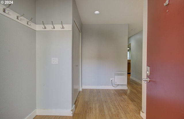 corridor featuring light hardwood / wood-style flooring