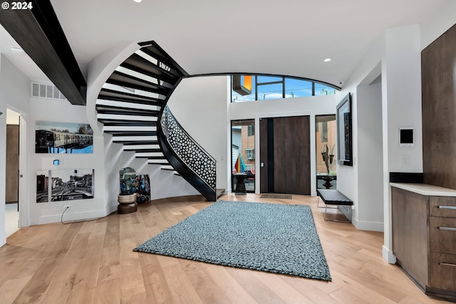 entrance foyer featuring light wood-type flooring