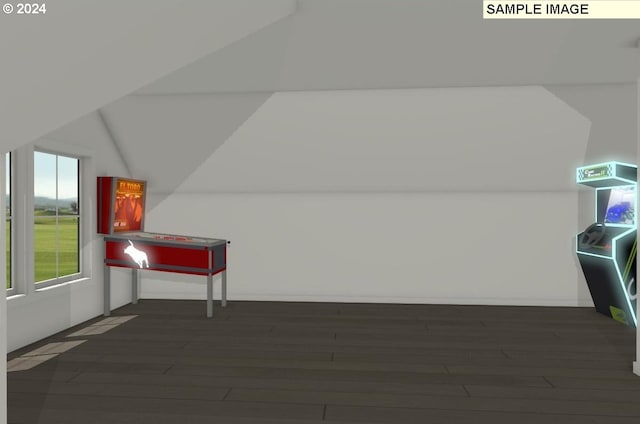bonus room with dark hardwood / wood-style floors and lofted ceiling
