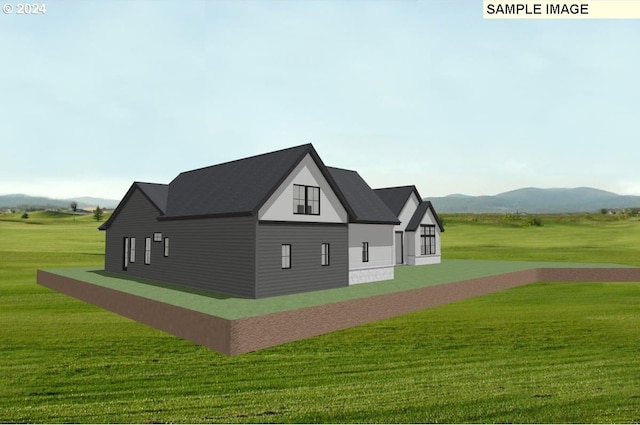 view of property exterior featuring a mountain view and a yard
