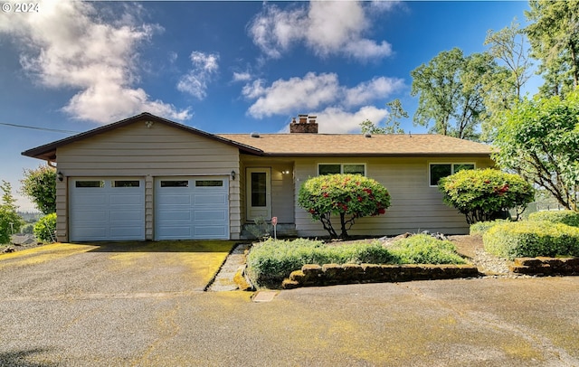 ranch-style house with a garage