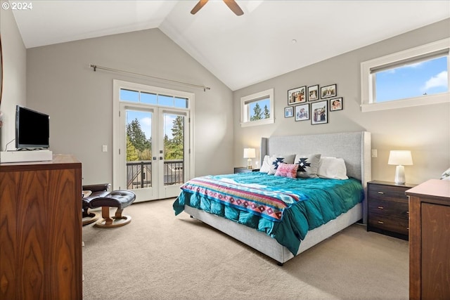 bedroom featuring french doors, vaulted ceiling, ceiling fan, light colored carpet, and access to exterior