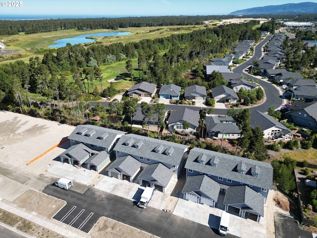 1587 37th St, Florence, OR 97439 - view of property location featuring a large body of water, nearby suburban area, and a local golf course