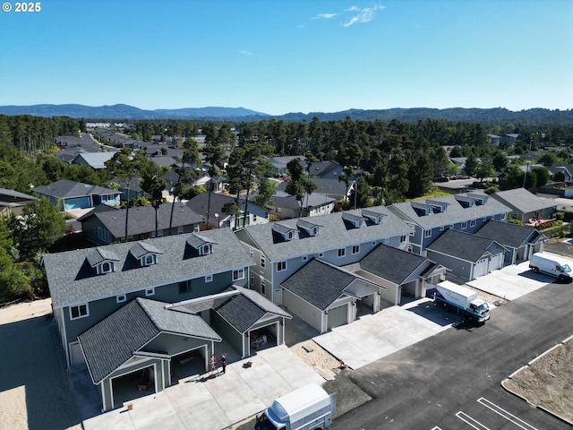 1587 37th St, Florence, OR 97439 - aerial view of residential area featuring mountains