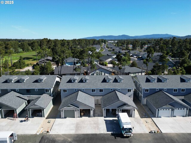 1587 37th St, Florence, OR 97439 - aerial perspective of suburban area featuring mountains