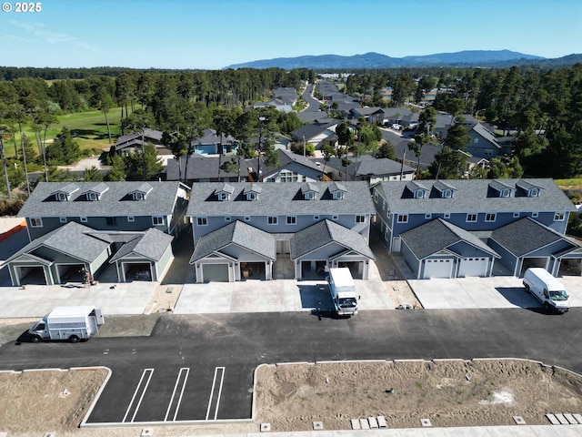 1587 37th St, Florence, OR 97439 - aerial view of residential area featuring mountains