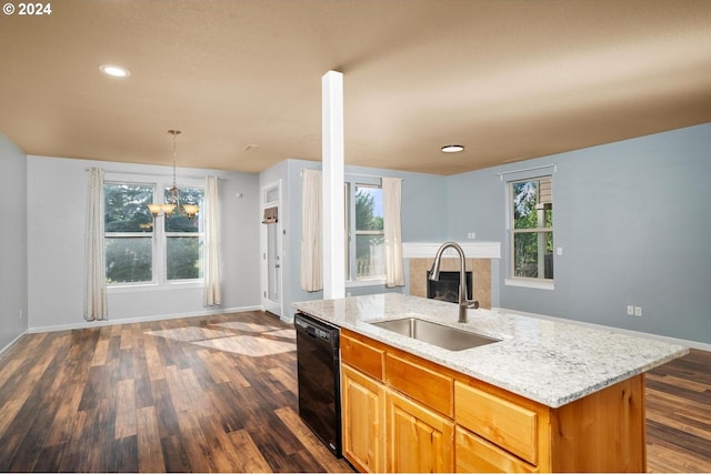 kitchen with dishwasher, a center island with sink, plenty of natural light, and sink