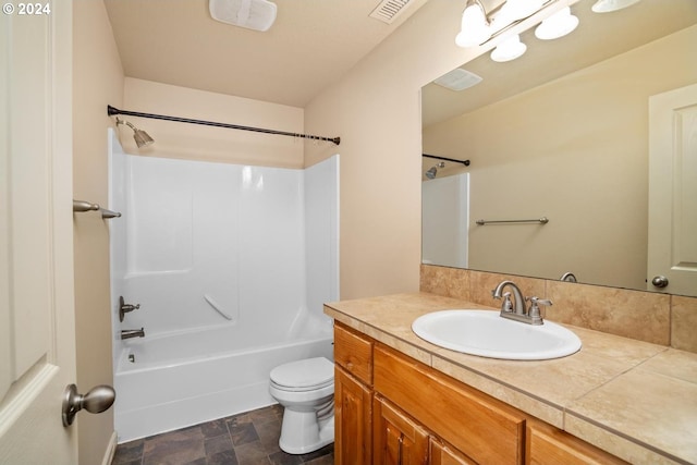 full bathroom featuring vanity, toilet, and shower / bathtub combination