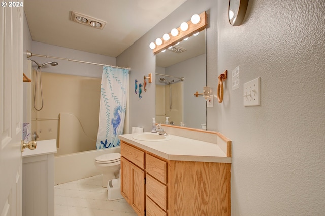 full bathroom with vanity, toilet, and shower / bath combo with shower curtain