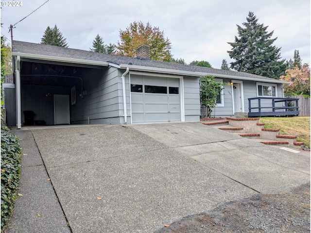 ranch-style home featuring a garage