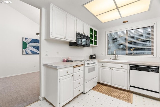 empty room featuring light carpet and vaulted ceiling