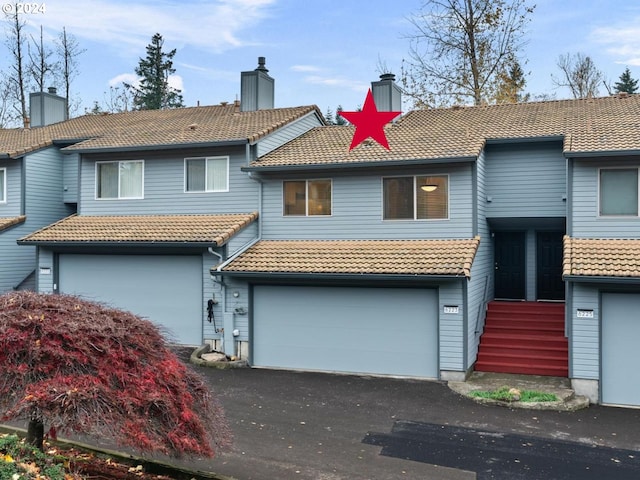 view of front of home with a garage