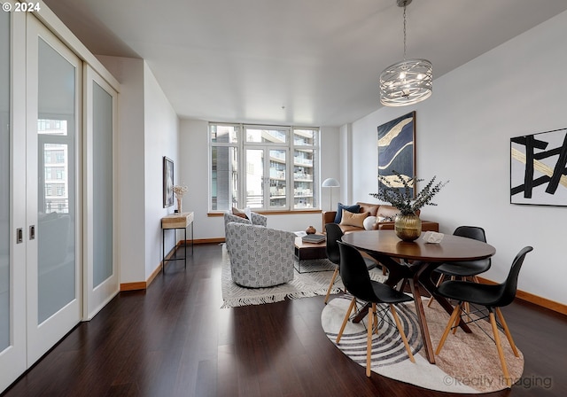 dining room featuring dark wood-type flooring